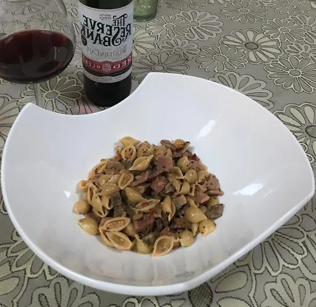 Cremoso Van Campanelle Met Ham En Champignons